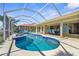 A beautiful sparkling pool and spa, perfect for backyard fun at 2160 Palm Tree Dr, Punta Gorda, FL 33950