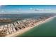 Stunning aerial view showcases the beachfront community along the picturesque coastline, a true paradise setting at 2255 N Beach Rd # 13, Englewood, FL 34223