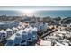 Stunning aerial view of beach homes, condos, and a construction project along the coastline at 2255 N Beach Rd # 13, Englewood, FL 34223