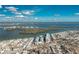 Stunning aerial view showcases the beachfront community along the picturesque coastline, a true paradise setting at 2255 N Beach Rd # 13, Englewood, FL 34223