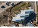 Stunning aerial view showcases a home with a metal roof, landscaping, and outdoor seating areas at 2255 N Beach Rd # 13, Englewood, FL 34223