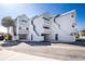 Exterior of modern beachfront condos with multiple units and parking spaces at 2255 N Beach Rd # 13, Englewood, FL 34223