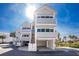 Charming three-story beach condo with ample parking and private balconies at 2255 N Beach Rd # 13, Englewood, FL 34223