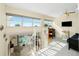 Bright loft featuring a home office, balcony, and ample natural light at 2255 N Beach Rd # 13, Englewood, FL 34223