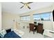 Bright loft featuring a home office, futon, and ample natural light at 2255 N Beach Rd # 13, Englewood, FL 34223