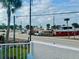 View from the property showing palm trees, the beach, and nearby construction at 2255 N Beach Rd # 13, Englewood, FL 34223