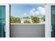Lovely palm tree views from the balcony in this condo at 2255 N Beach Rd # 13, Englewood, FL 34223