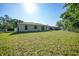 Spacious backyard showing the property at 2495 De Garmo St, North Port, FL 34291