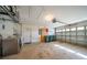 Spacious garage with washer/dryer, door and storage at 2495 De Garmo St, North Port, FL 34291