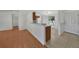 The expansive living room features stylish floors and a sun-filled dining area at 2495 De Garmo St, North Port, FL 34291