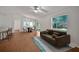 Spacious living room with stylish floors and furniture set, filled with natural light at 2495 De Garmo St, North Port, FL 34291