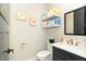 Well-organized powder room featuring modern fixtures and stylish decor at 25583 Prada Dr, Punta Gorda, FL 33955