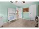 Bright bedroom with display cabinet and tiled flooring at 3 Bunker Pl, Rotonda West, FL 33947