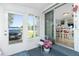 Cozy sunroom with sliding glass doors, offering natural light and indoor/outdoor living at 3220 Holly Ave, Englewood, FL 34224