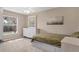 Comfortable bedroom features a bed with under-bed storage and a large dresser by the window at 4050 Rock Creek Dr, Port Charlotte, FL 33948