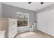 Bedroom features a window with natural light and a closet at 4050 Rock Creek Dr, Port Charlotte, FL 33948
