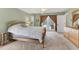 Bedroom with a large window and access to a balcony through glass doors providing ample natural light at 4050 Rock Creek Dr, Port Charlotte, FL 33948
