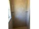 Modern shower featuring sleek tile walls, built-in shelves, and a stylish mosaic tile floor at 4050 Rock Creek Dr, Port Charlotte, FL 33948