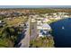 Aerial view of a community with a lake and community building at 414 Circlewood Dr # H2, Venice, FL 34293