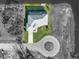 High angle view of a single Gathering home next to a lake and cul-de-sac at 5 Reef Ct, Placida, FL 33946