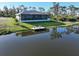 Aerial view of the dock and the back of the home at 5 Reef Ct, Placida, FL 33946
