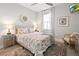 Relaxing bedroom with a cozy rug, side tables, and stylish decorative accents at 5 Reef Ct, Placida, FL 33946
