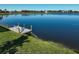 Dock with seating overlooking a lake at 5 Reef Ct, Placida, FL 33946