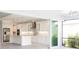 Gourmet kitchen with stainless steel appliances, custom cabinetry, and granite countertops at 5213 Willow Lake Ct, Sarasota, FL 34233