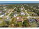 An aerial view showcasing the property's location in a beautiful, established neighborhood at 5441 Farley St, Port Charlotte, FL 33981