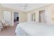 Spacious bedroom with walk-in closet offers a neutral palette and ample natural light at 5441 Farley St, Port Charlotte, FL 33981