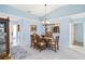 Cozy dining room with a chandelier and classic furniture at 613 Chestnut Ln, Englewood, FL 34223