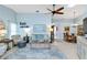 Open-concept living room flows into a dining area, perfect for entertaining at 613 Chestnut Ln, Englewood, FL 34223