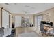 Comfortable living room with a sliding barn door, work station and views of the yard at 6264 Drucker Cir, Port Charlotte, FL 33981