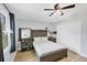 Bright main bedroom with a comfortable bed and an abundance of storage space at 6264 Drucker Cir, Port Charlotte, FL 33981