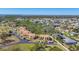 Aerial view of the community showing the buildings, landscaping and parking at 6699 San Casa Dr # Q3, Englewood, FL 34224