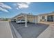 Carport parking with designated storage locker, close to front door of condo at 6796 Gasparilla Pines Blvd # 40, Englewood, FL 34224