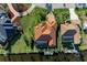 Birds eye view of terracotta tile roof with a private dock on the water at 8264 Antwerp Cir, Port Charlotte, FL 33981