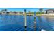 Close up of weathered dock pilings in the water at 8264 Antwerp Cir, Port Charlotte, FL 33981