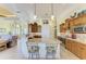 Open kitchen featuring a breakfast bar, granite counters and stainless steel appliances at 8264 Antwerp Cir, Port Charlotte, FL 33981