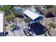 Coastal home with surrounding greenery featuring a durable metal roof and easy access stairs in a beautiful location at 8694 Marsh St, Placida, FL 33946