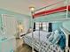 A bedroom with bunk beds and ocean-themed bedding and decor at 8694 Marsh St, Placida, FL 33946