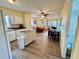 Kitchen open to living areas and features a movable island and updated appliances at 8694 Marsh St, Placida, FL 33946