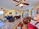 Spacious living room flows seamlessly into the dining and kitchen areas, perfect for entertaining at 8694 Marsh St, Placida, FL 33946