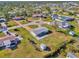 Aerial view showing the home's location in a pleasant neighborhood at 91 Beverly Cir, Englewood, FL 34223