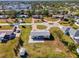 Aerial view of the property showcasing its location within a residential neighborhood at 91 Beverly Cir, Englewood, FL 34223