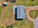 An aerial view of a well-maintained home featuring a new roof and tidy landscaping at 91 Beverly Cir, Englewood, FL 34223