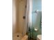 Bright shower area with a white shower curtain and tiled walls at 91 Beverly Cir, Englewood, FL 34223