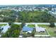 Aerial view of the property showing its location within a neighborhood at 9341 Oceanspray Blvd, Englewood, FL 34224