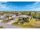 Desirable waterfront property with a three-car garage and lush tropical landscaping at 9460 Migue Cir, Port Charlotte, FL 33981
