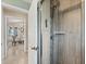 This shower features gray tile and stylish shower head, and is located near the dining area at 9460 Migue Cir, Port Charlotte, FL 33981